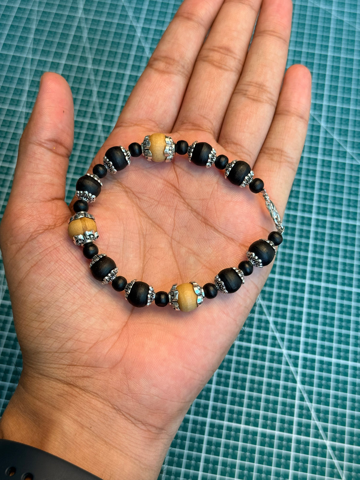 Tulsi Hand Bracelet Black Round Beads & German Silver caps