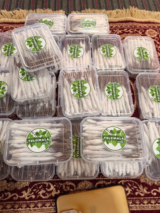 Stacked boxes of Tulsimalastore tulsi stick wicks ready for dispatch