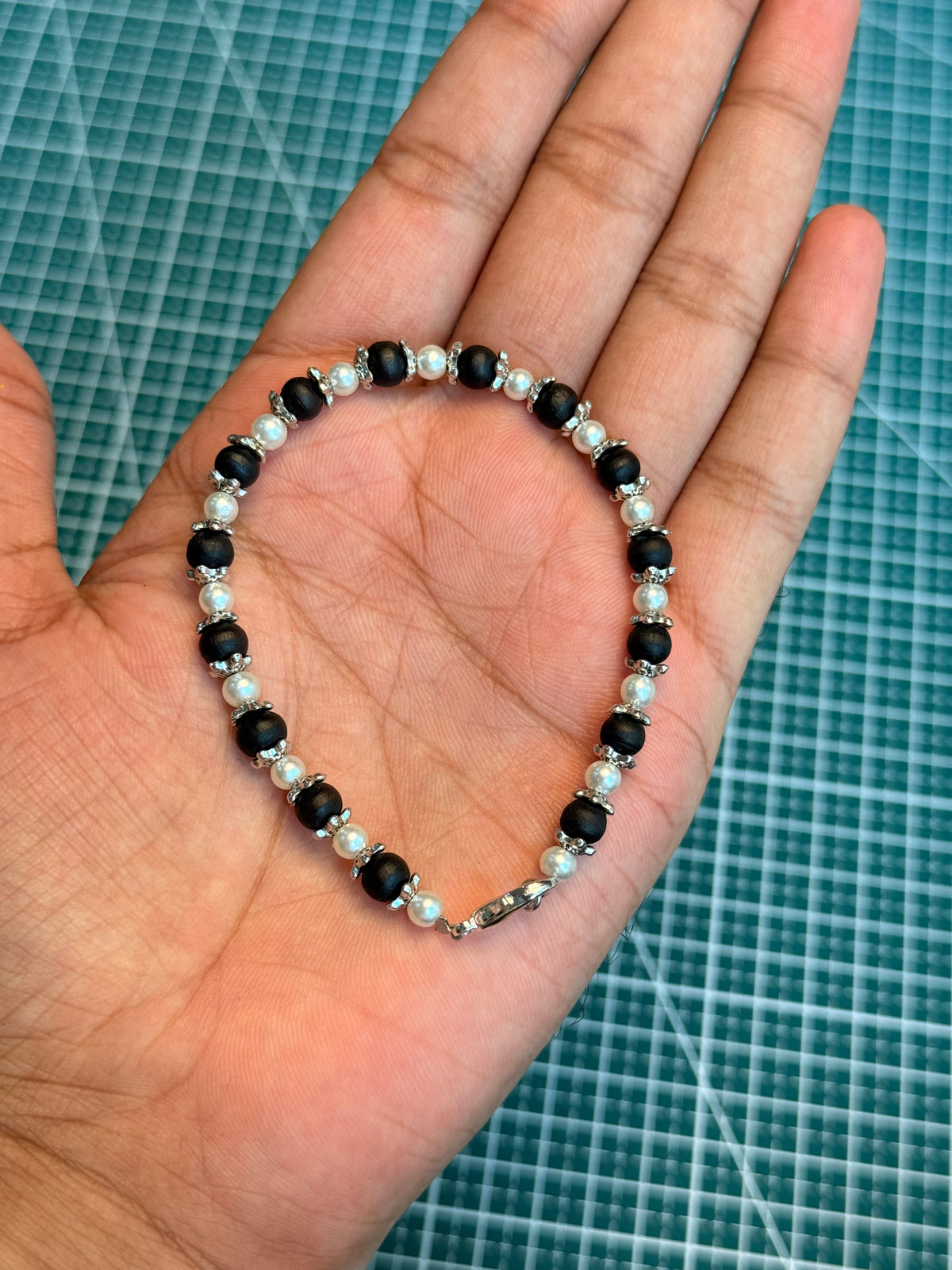 Tulsi Hand Bracelet Black Round Beads with German Silver Caps