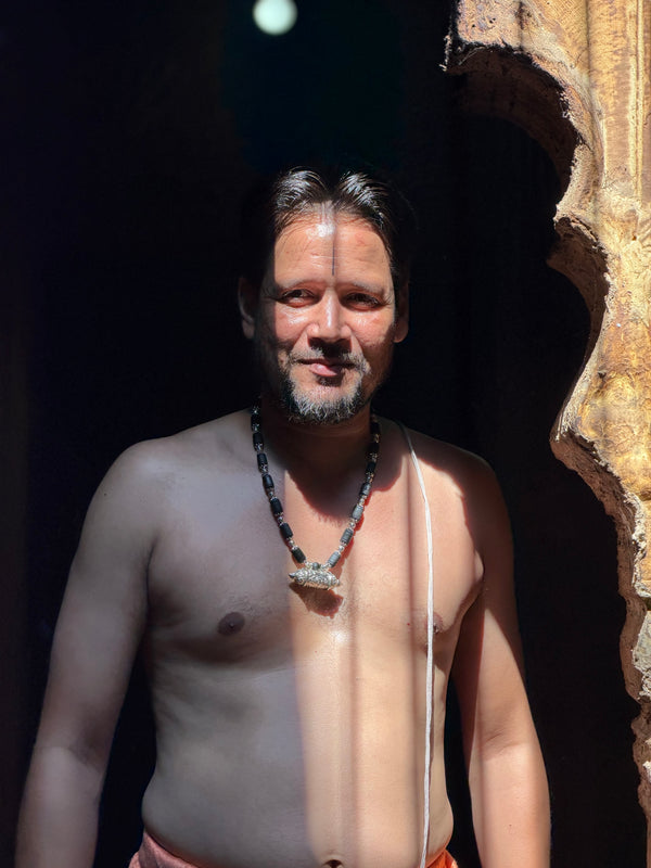 Devotee wearing the Bhaktamal kavach tulsi kanthi mala in sunlight
